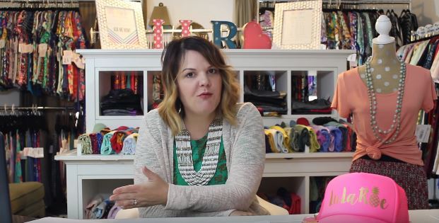 A lularoe Consultant with lots of clothing